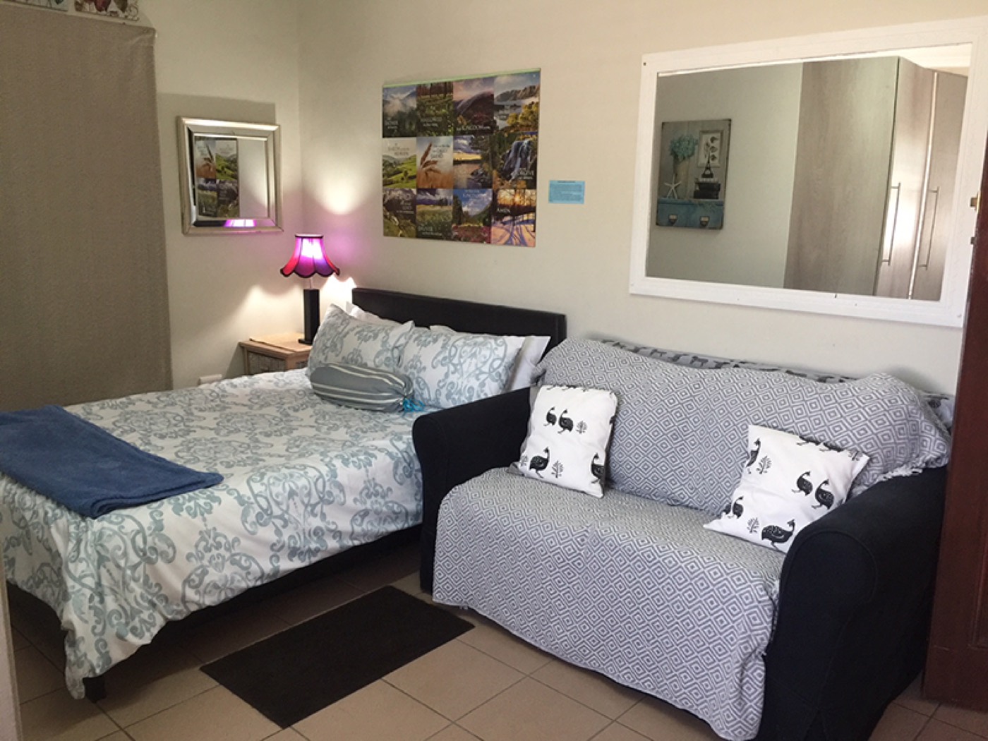 Atrium Suite bedroom with queen bed